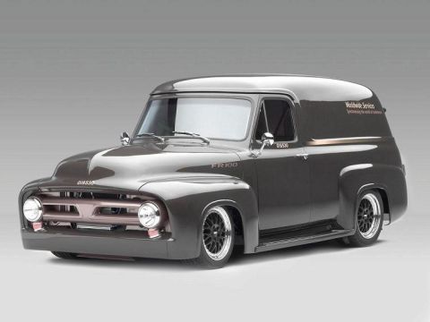1990 Ford Bronco - Studio shot of a slammed gray custom 1950s Ford panel delivery truck with FR100 graphics and chrome wheels.