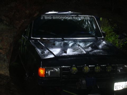 1991 Ford Bronco - This black 1991 Ford Bronco is equipped with auxiliary off-road lights and a club sticker on its windshield, suggesting it's part of a 4x4…