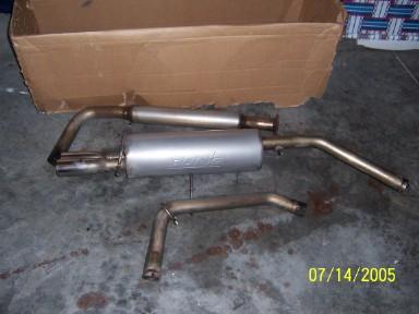 1994 Ford Probe - Exhaust system components shown before installation or after removal.