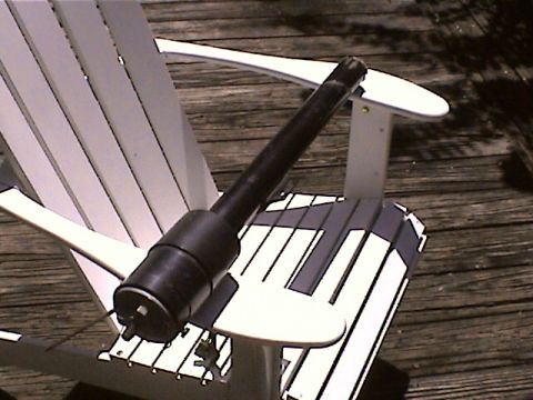 1978 Ford Bronco - A steering column component is shown on a chair outdoors. The website 'supermotors.net' is visible.