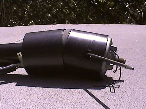 1978 Ford Bronco - Steering column assembly shown outdoors on a textured surface.