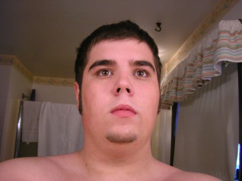 1990 Ford Probe - This is a photo of a man's face in what appears to be a bathroom.