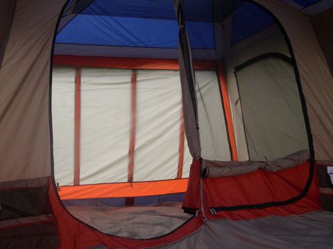 1997 Ford Probe - Inside a large tent, showing the sleeping area and entrance. Watermark present.