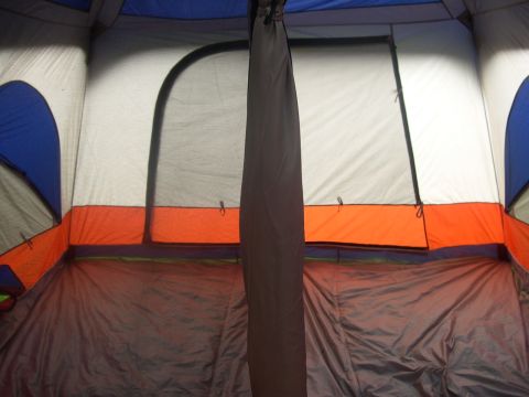 1997 Ford Probe - Inside a large tent, showing the floor, walls, and mesh windows.