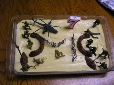 1990 Ford Probe - Toy soldiers and a helicopter are placed on a cake decorated for a 7th birthday.