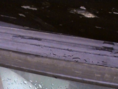 1978 Ford Bronco - The rubber seal around the window shows signs of wear and tear.