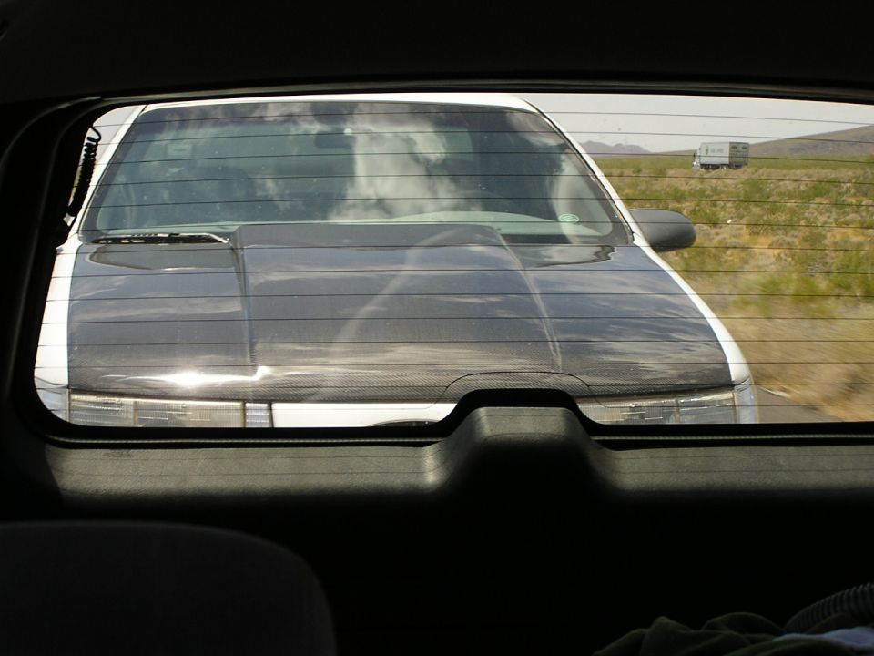 1993 Ford Taurus rear view with aftermarket black hood