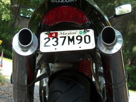 2002 Suzuki TL1000R - A motorcycle's rear view, dual exhaust and a Maryland license plate.