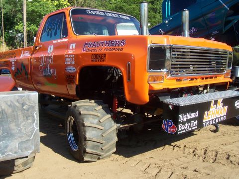 1994 Ford F-150 - This heavily modified truck, nicknamed "Wild Turkey," features oversized tires and custom paintwork, suggesting it's built for off-road eve…