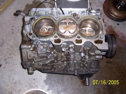 1994 Ford Probe - Engine block with pistons exposed, photographed on July 16, 2005.