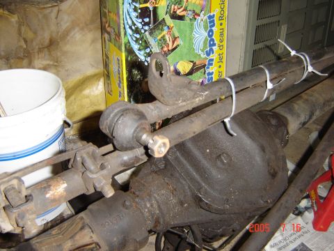 1993 Ford Bronco - Close-up of a front axle assembly, possibly from a 1993 Ford Bronco, showing steering linkage.