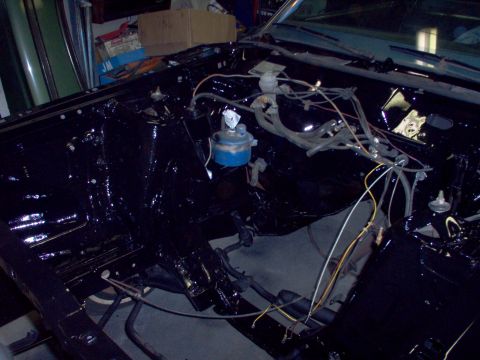 1970 Ford Ranchero - Engine bay undergoing restoration, showing painted surfaces and components.