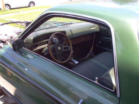 1970 Ford Ranchero - added grant steering wheel, b&m shifter, guages & tach.