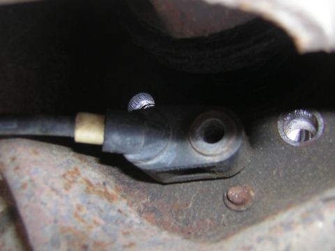 1995 Ford Bronco - Detail of a vehicle component, likely part of the undercarriage or engine bay.