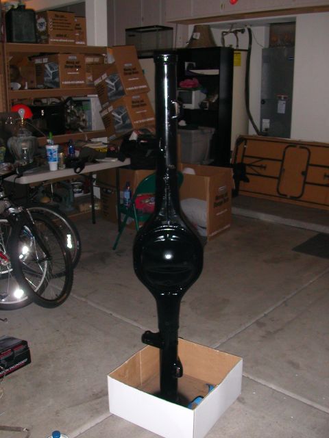 1984 Ford Bronco - A freshly painted rear axle assembly is shown, likely awaiting installation or further work.
