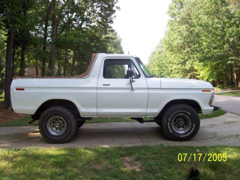 1979 Ford Bronco - This SUV has a removable brown soft top and off-road tires. The date stamp indicates it was photographed in 2005.