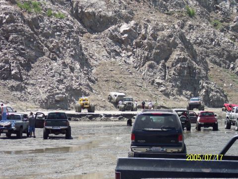 1985 Ford Bronco - A collection of off-road vehicles are seen in a , mountainous area, with a date stamp of 2005/07/17 visible.