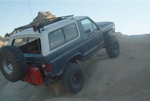 1986 Ford Bronco - This 1986 Ford Bronco is equipped for off-road adventures with a spare tire and auxiliary fuel cans.