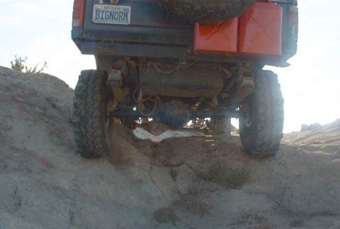 1986 Ford Bronco - This Ford Bronco is equipped with off-road tires and auxiliary fuel cans for terrain.