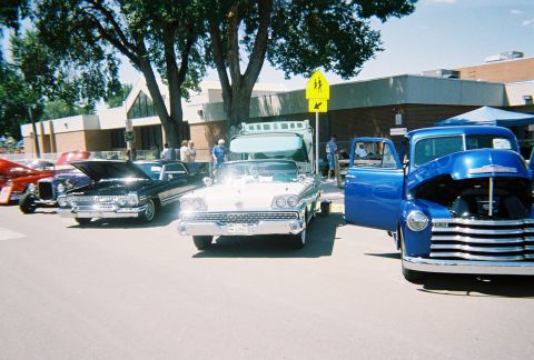 1972 Ford Ranchero - A collection of vintage cars and trucks displayed at an outdoor event.