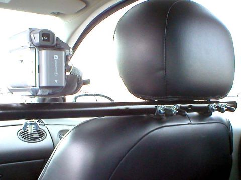 2004 Ford Focus - Note the vacuum fittings to cover up the U-Bolt ends. After all is said and done, SCCA requires a strap between the camera and the mount to…