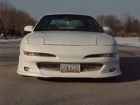 1993 Ford Probe - Front view of a white 1993 Ford Probe, displaying license plate CFW 6735.