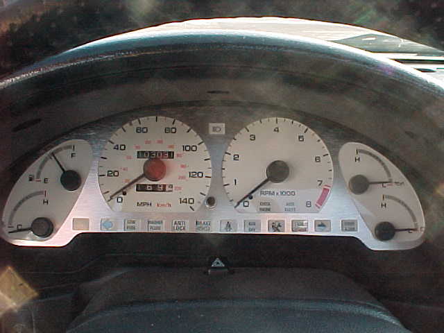 1993 Ford Probe dashboard with speedometer, tachometer, fuel gauge, and temperature gauge