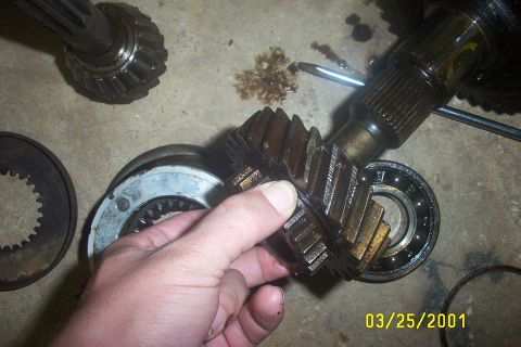 1979 Ford F-150 - Close-up of transmission gears and a bearing, suggesting a repair or disassembly process.
