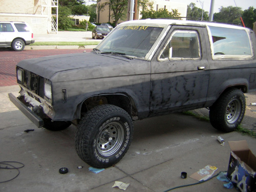 1986 Ford Bronco II in primer, 3q front view