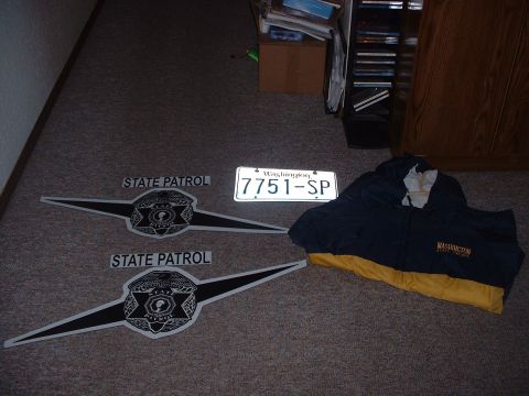 1999 Ford Crown Victoria - The decals with a WSP windbracker jacket and a real WSP license plate once issued to a WSP car. All of these are for EVOOA shows only.