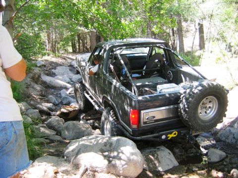 1985 Ford Bronco - This 1985 Ford Bronco is shown navigating a challenging rocky trail.