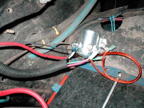1979 Ford Bronco - Automotive wiring harness detail showing a relay and various colored electrical cables.