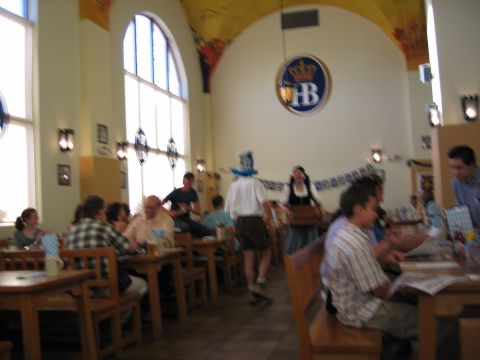 2003 BMW Z4 - A busy restaurant scene with patrons enjoying their meals and a festive atmosphere.