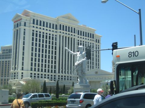 2003 BMW Z4 - View of Caesars Palace hotel and casino, a statue, and traffic on a sunny day.