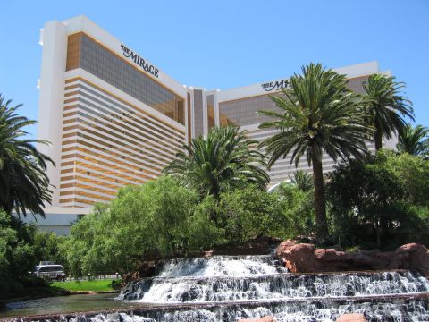 2003 BMW Z4 - A white van is visible in front of The Mirage hotel in Las Vegas, with a waterfall in the foreground.