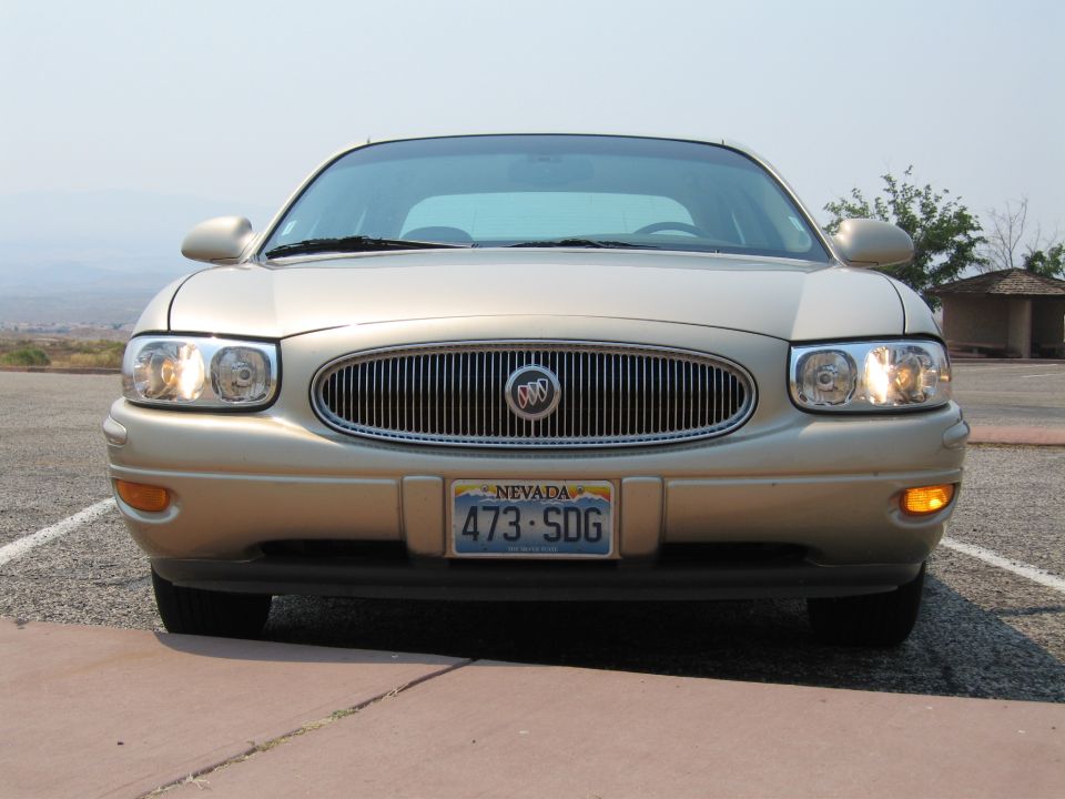 Front view of a gold Buick LeSabre with a Nevada license plate