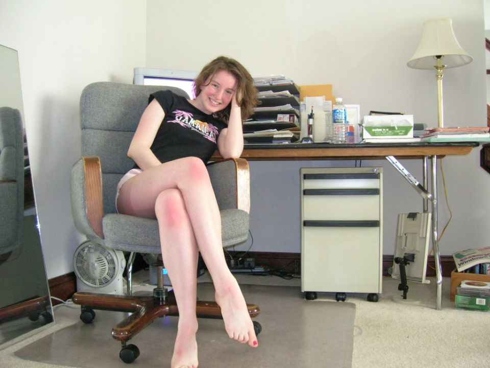 Person sitting in an office chair at a home desk