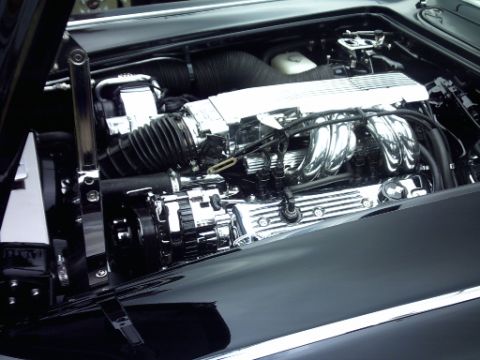 1995 Ford Probe - Engine bay details with polished chrome components visible.