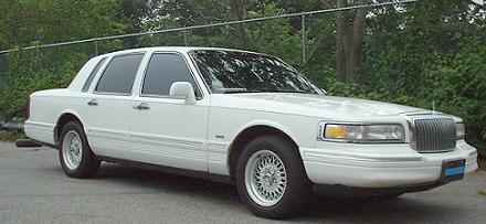 1997 Ford Crown Victoria - This white sedan is a 1995 Lincoln Town Car, not a 1997 Ford Crown Victoria.
