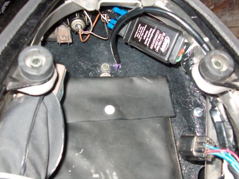 2002 Suzuki TL1000R - Close-up of a motorcycle's electronic taillight converter module and wiring.
