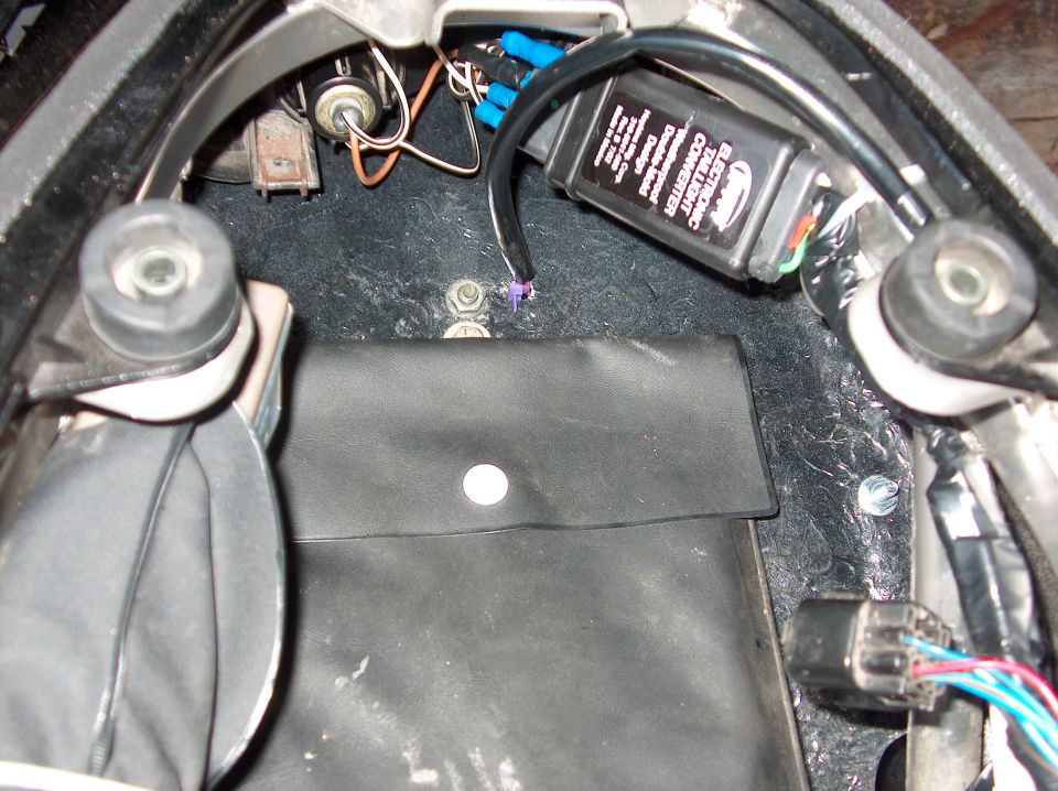 Electronic Tailight Converter module with wiring and a black pouch