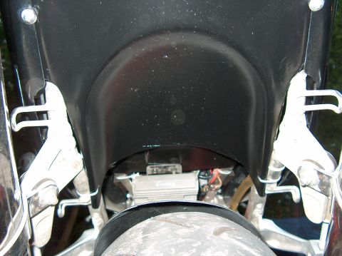 2002 Suzuki TL1000R - Close-up view of a motorcycle's rear fender and tire, the Supermotors.net watermark.