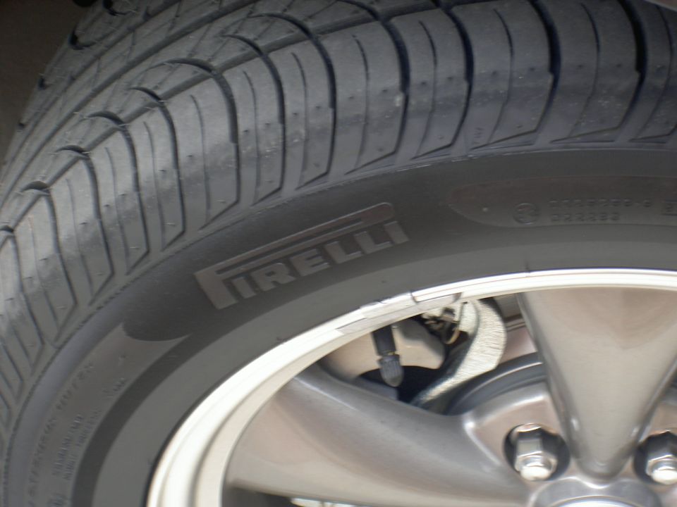 Close-up of a Pirelli tire on a car wheel
