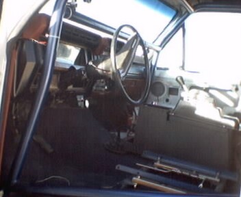 1981 Ford Bronco - Interior view of a vehicle, showing the dashboard and steering wheel.