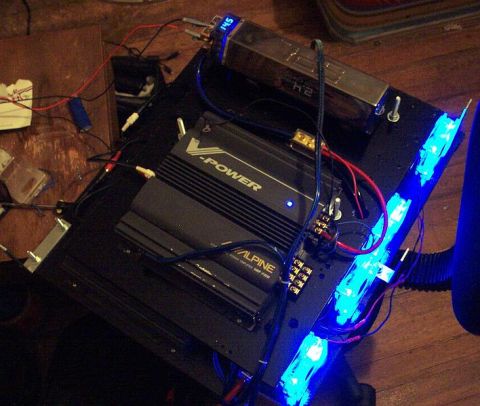 1985 Ford LTD Crown Victoria - Custom amp rack with Alpine and V-Power car audio amplifiers wired up and lit by blue neon tubes