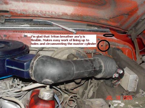 1978 Ford Bronco - The photo shows engine components, including an air intake system and wiring, with a text overlay discussing a breather assembly.