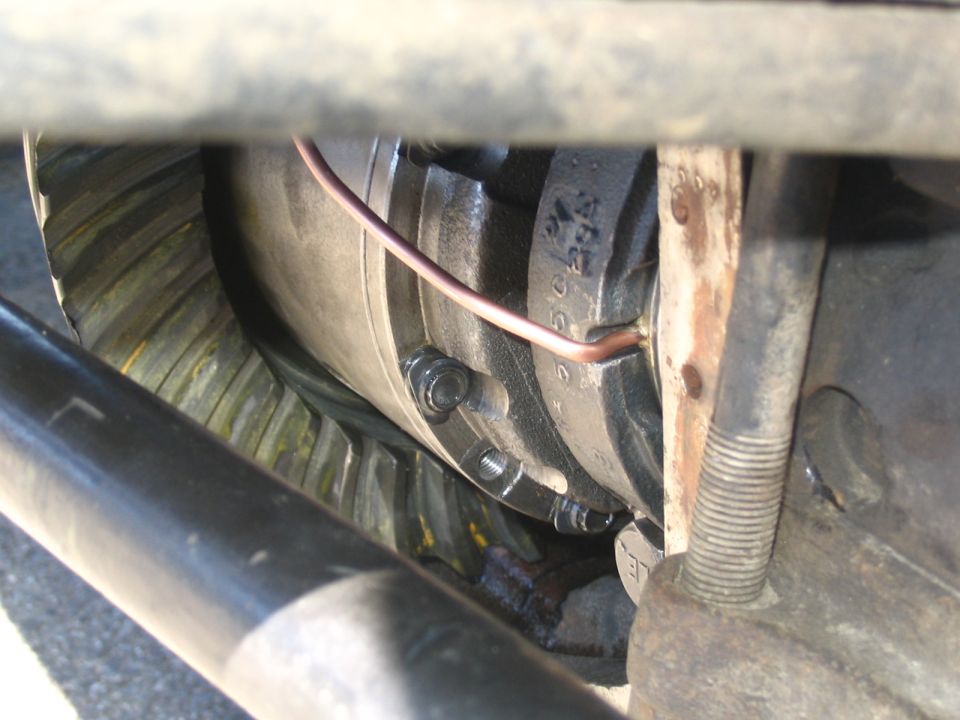 Open differential showing ring gear and copper air line to a locker carrier