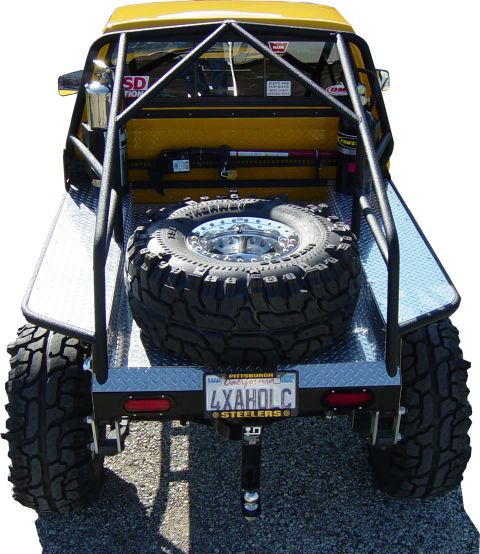 1979 Ford F-150 - Rear view of a modified 1979 Ford F-150 pickup truck a custom bed and spare tire.