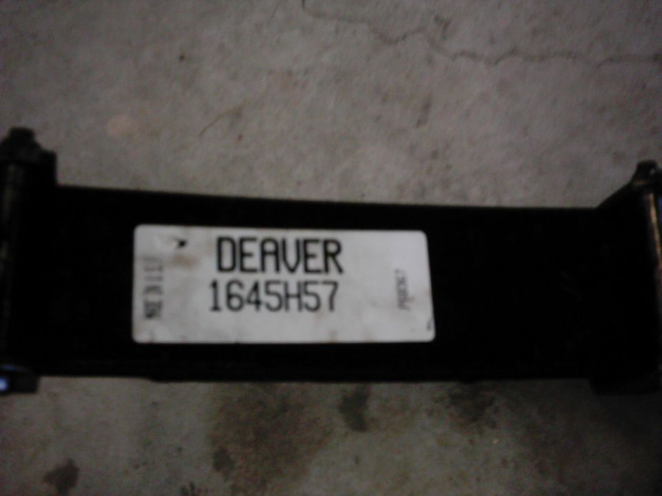 Black metal component with a white label reading DEAVER 1645H57