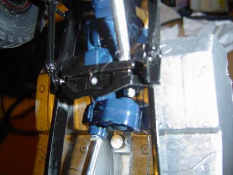 1979 Ford Bronco - The underside of a model vehicle's chassis, showing suspension and frame components.